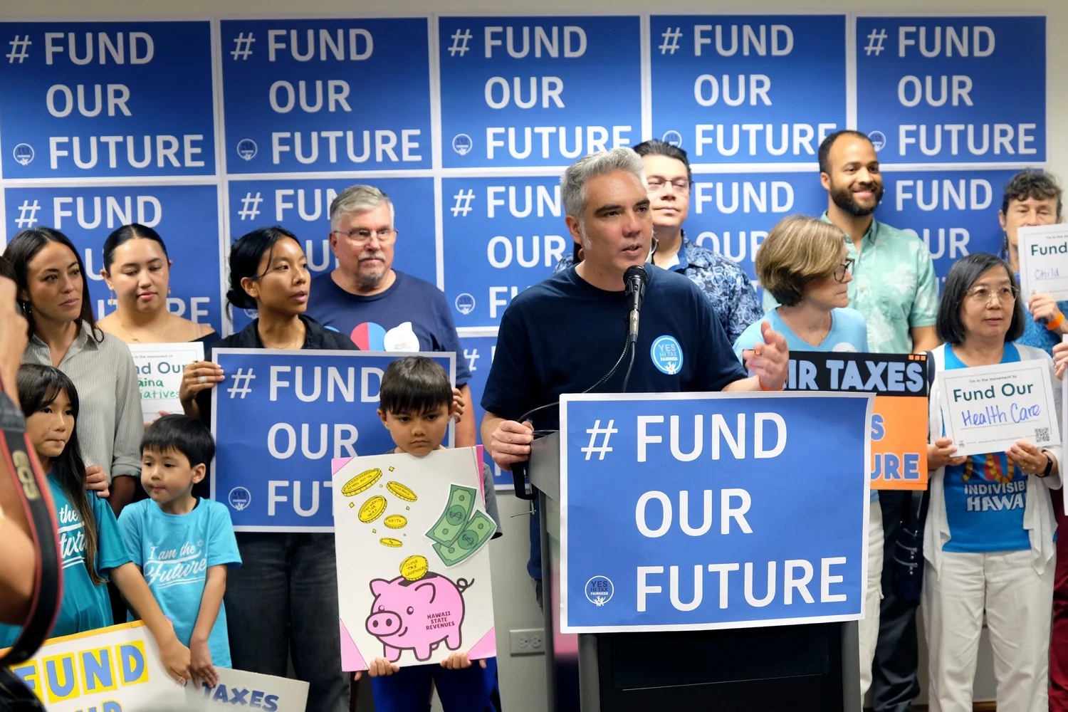 Hawaiʻi Appleseed's third executive director, Will White, emcees a 2026 Fund Our Future press conference.